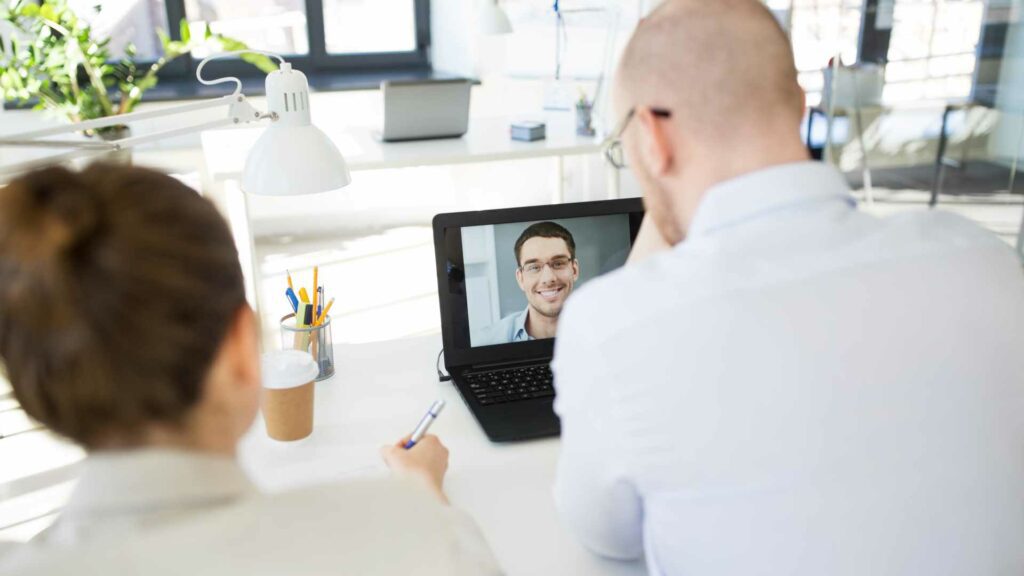 HR team doing virtual interview of candidate during recruiting process