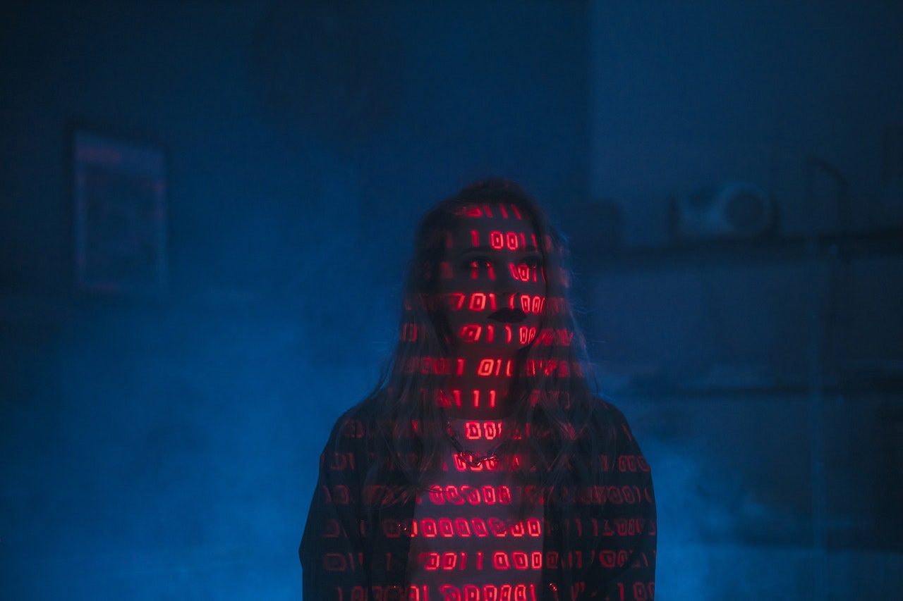 a women covered in the shadow of codes