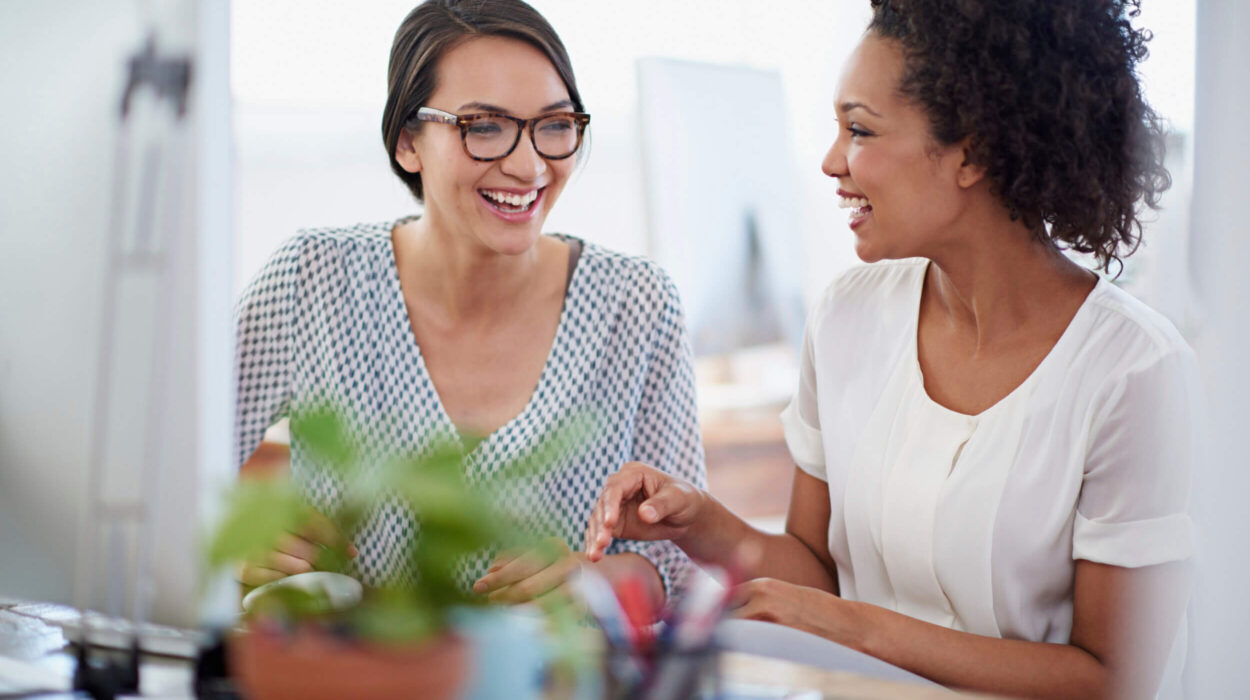 two women talking to each other about website design